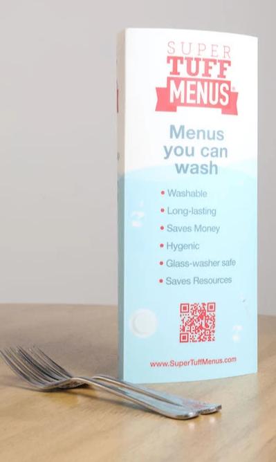 Large tall washable 3 sided table talker beside forks for scale